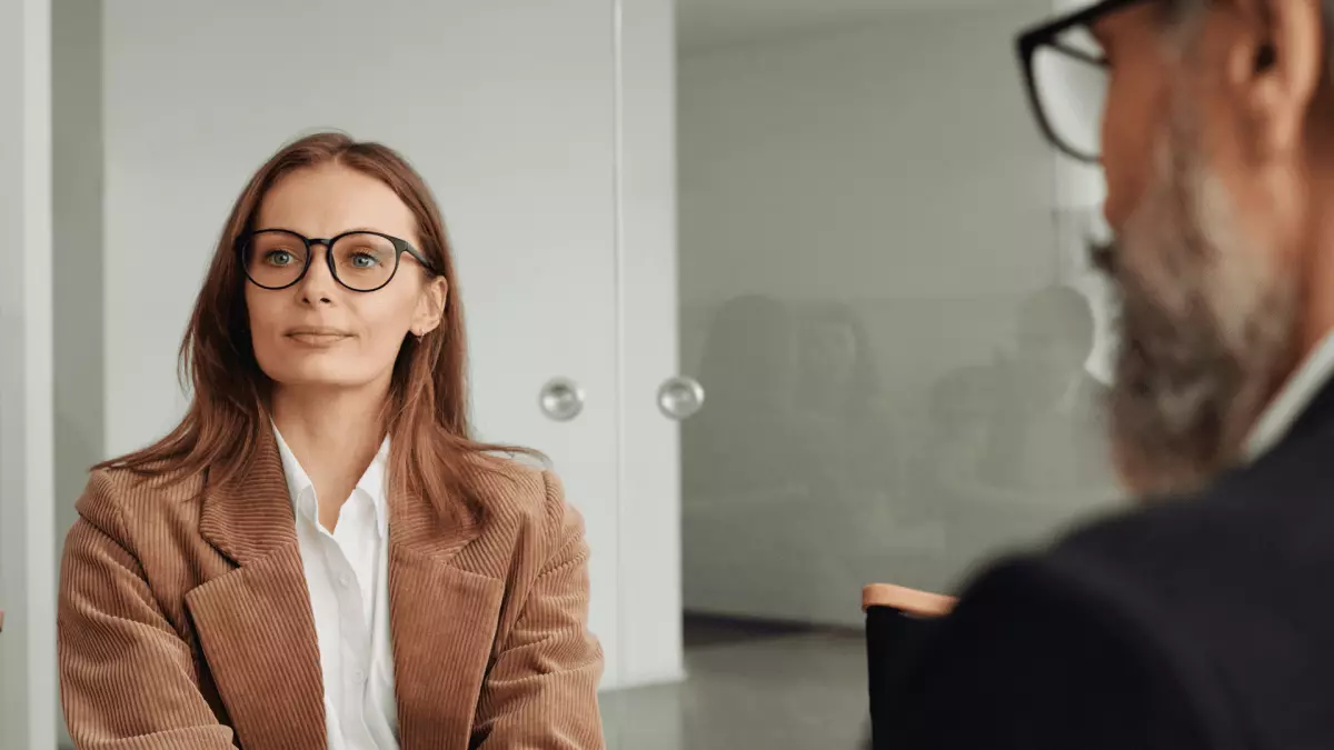 A real estate agent sitting with their real estate mentor