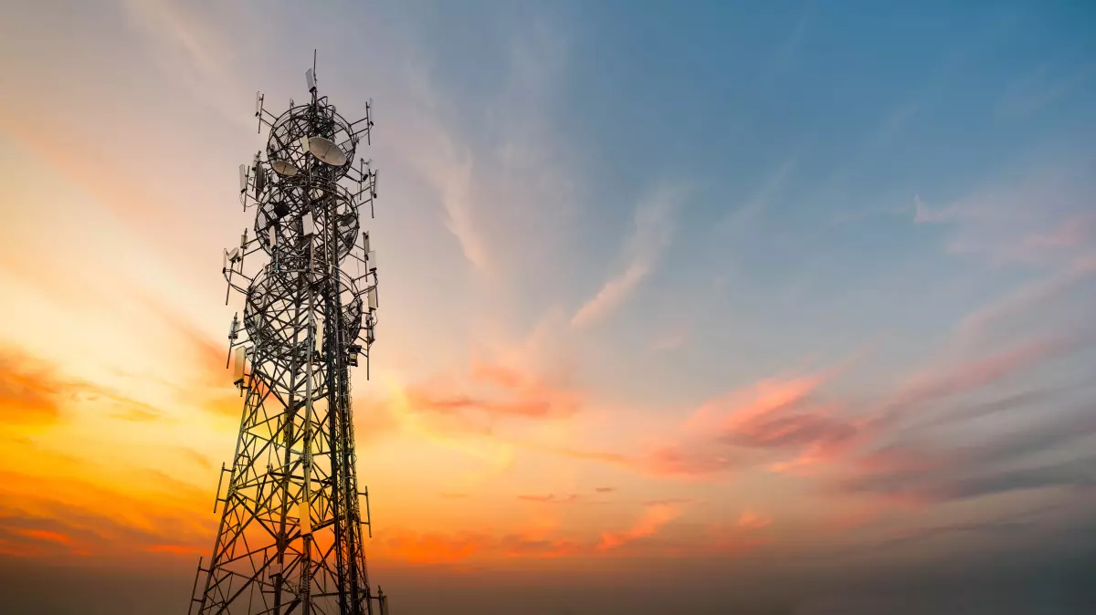 5G Sunset Cell Tower: Cellular communications tower for mobile phone and video data transmission