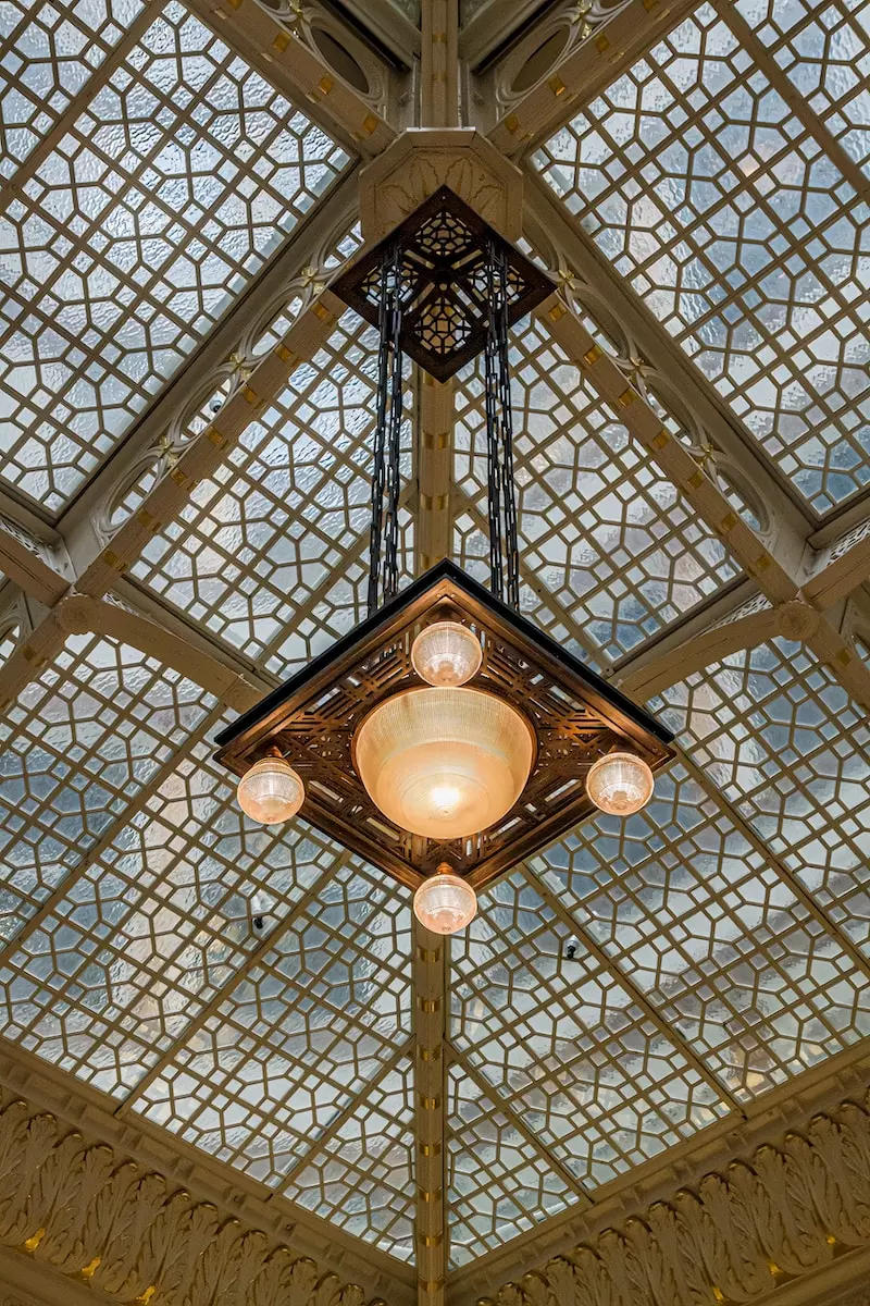 A chandelier hanging from the ceiling of a building