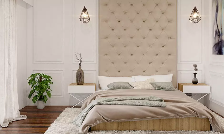 Bedroom in a classic modern house interior with a greyish-blue accent wall behind the bed adds a breathtaking effect.