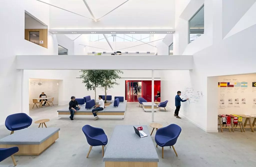 A office room with a wooden table and chairs