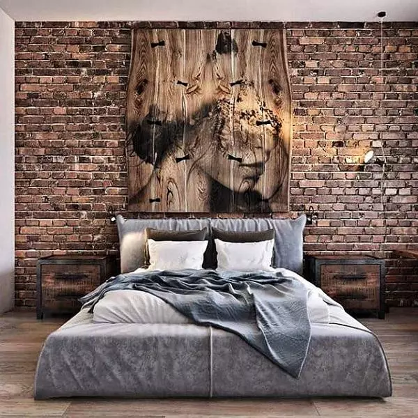 This interior design is excellent in two styles with rustic brick walls and modern minimalist home decor. The ceiling beams, fireplaces, picture frame on the wall, give a cozy feel to the living room. It will definitely warm your soul in the cold winter months.