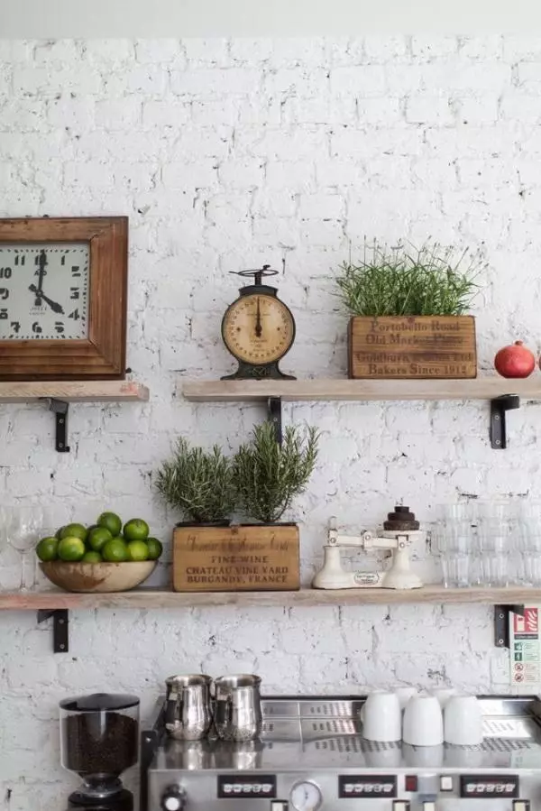 You can paint a brick wall in a shade that will blend well with your entire interior. In this case, it's white!