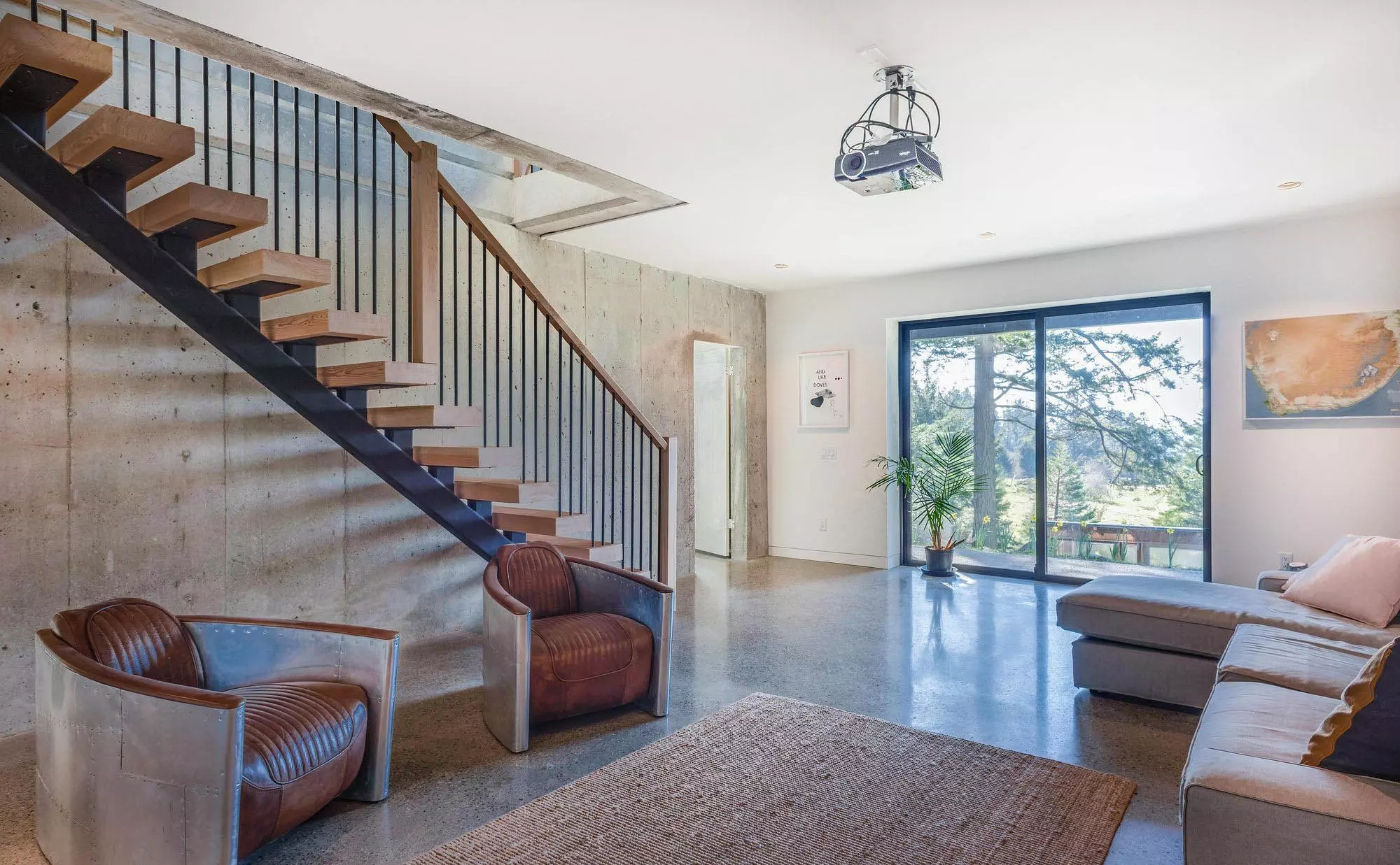 Modern staircase with raw concrete walls. Industrial design.