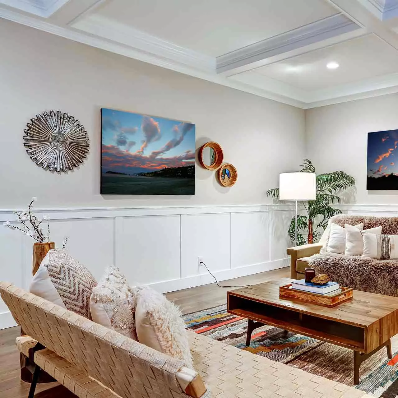 Use sand-colored fabrics and driftwood accents to complement the beach style living room interiors