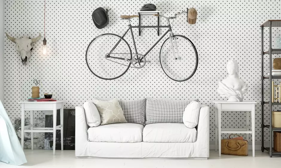 Eclectic white open shelves placed along one wall in the drawing room for a chic look