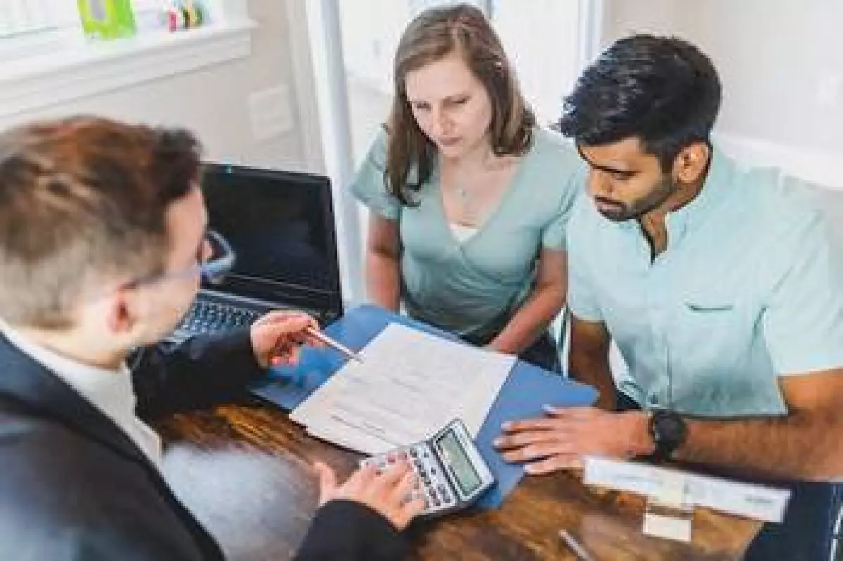 A group of people discussing the FHA amendatory clause.