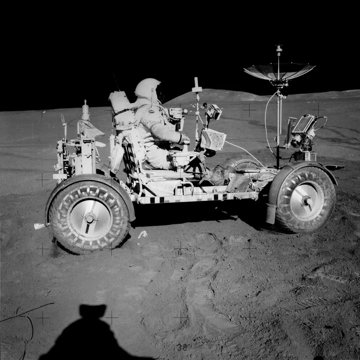 Scott rides the LRV, which was the first car on the moon.