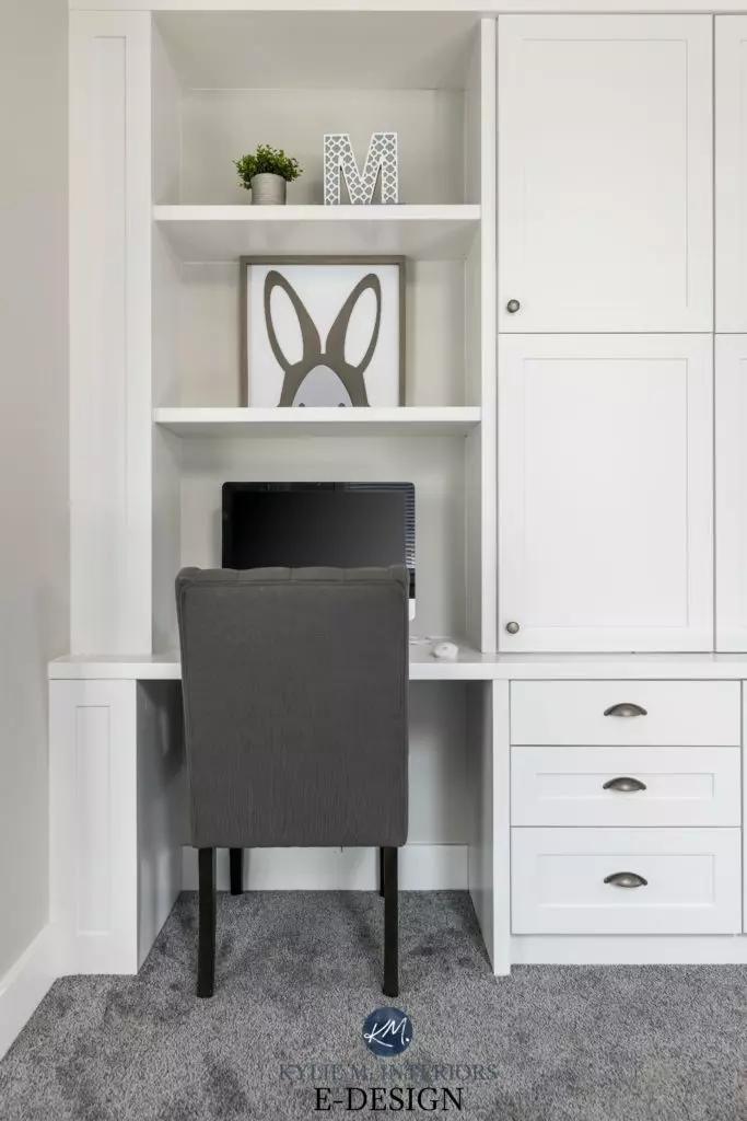 Study or homework office desk nook for kids with white cabinets and shelves with gray chair and carpet. Kylie M Interiors Edesign, online paint color consulting advice