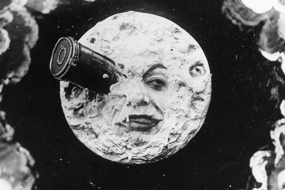 A scene from Georges Méliès's 1902 film A Trip to the Moon, the moon with a rocket in it