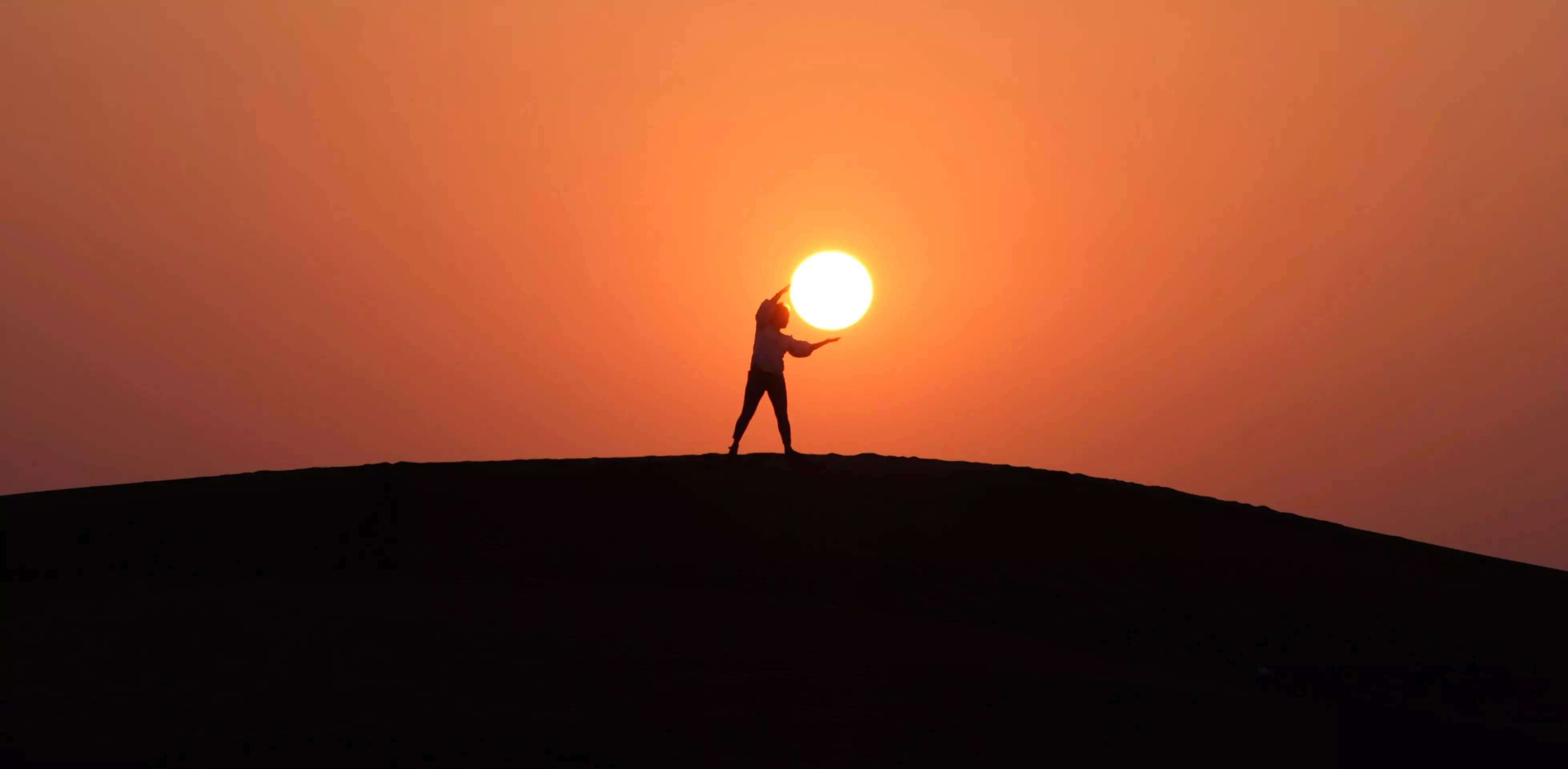 Man holds sun