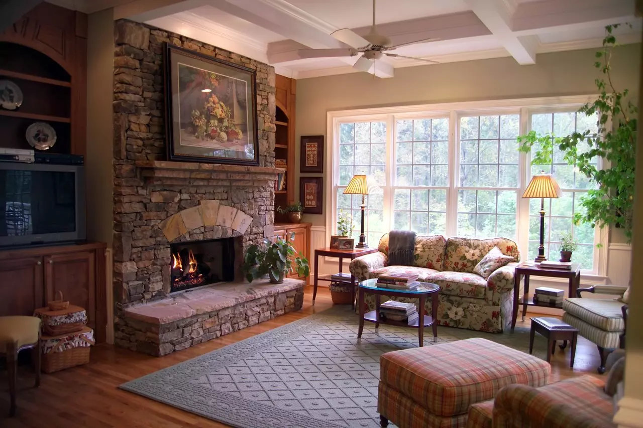 Stone-clad wall with a fireplace