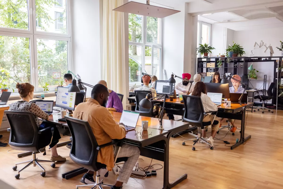 Creative business team working in an open plan office