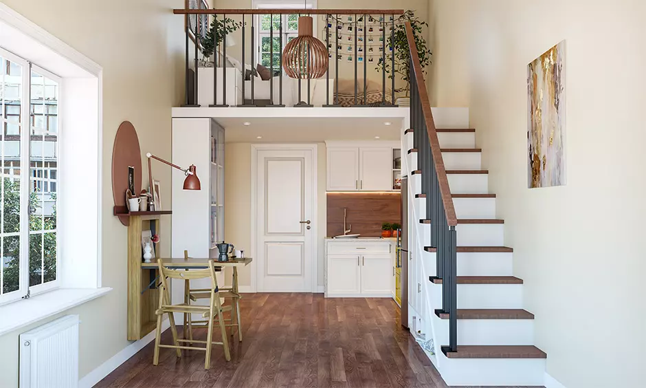 The small cozy apartment features a mini kitchen, dining space, and living room in an open-plan layout