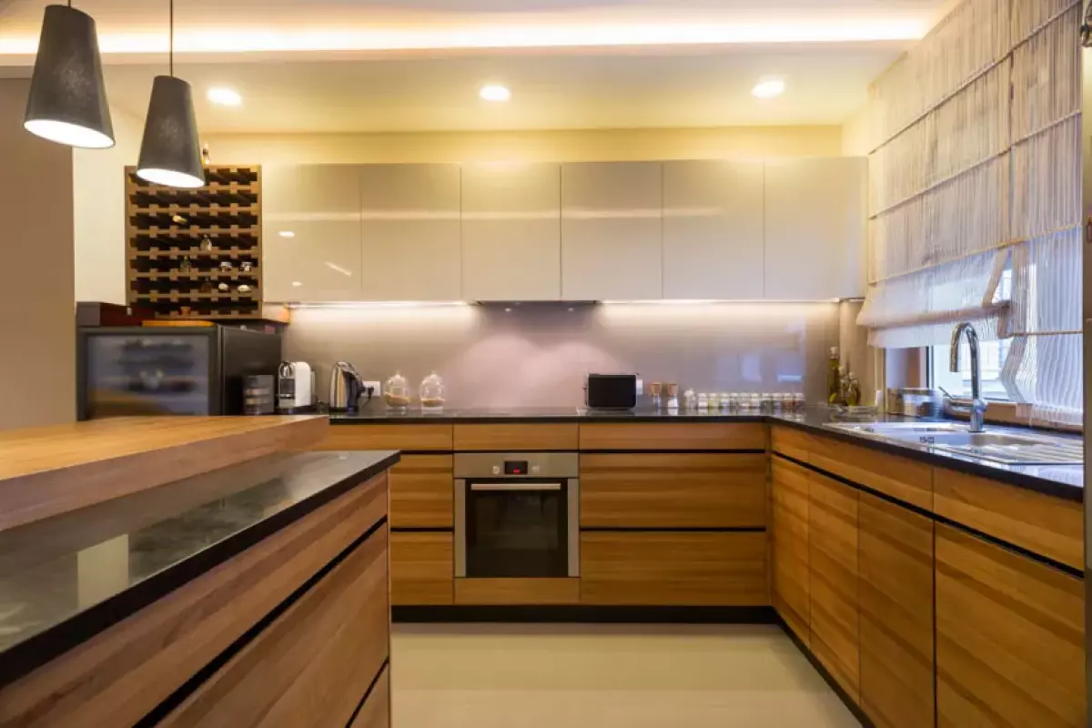 Kitchen with floating base cabinets, countertops, and pendant lights