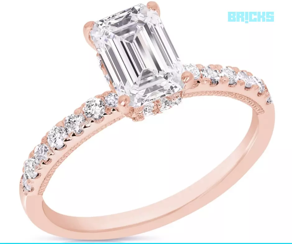 A bridal diamond ring in a side stone ring design