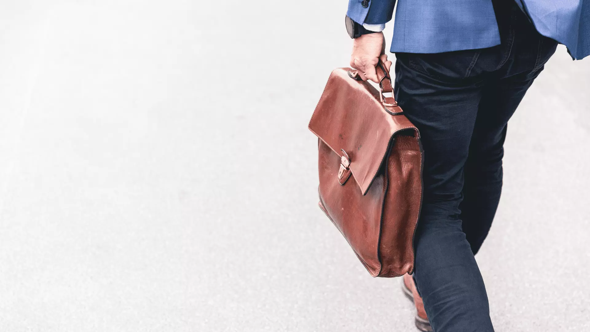 agent holding suitcase