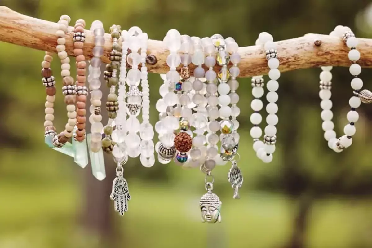 Bracelets hanging on tree branch