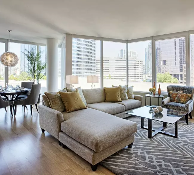 Spacious and airy living room in a modern condo unit.