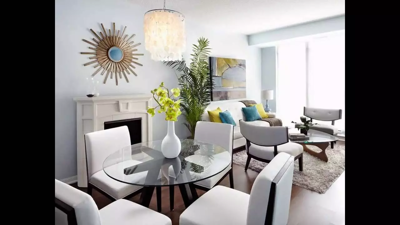 Modern dining and living room in a studio condominium.