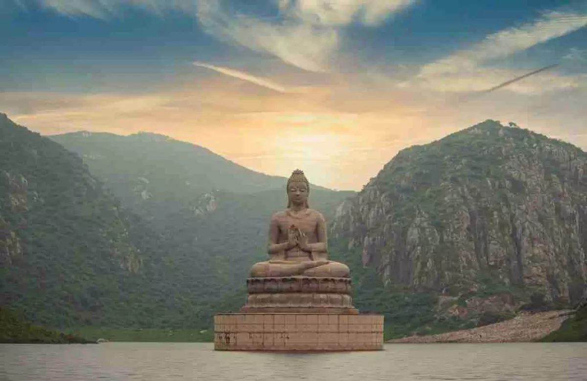 Buddha statue with mountains