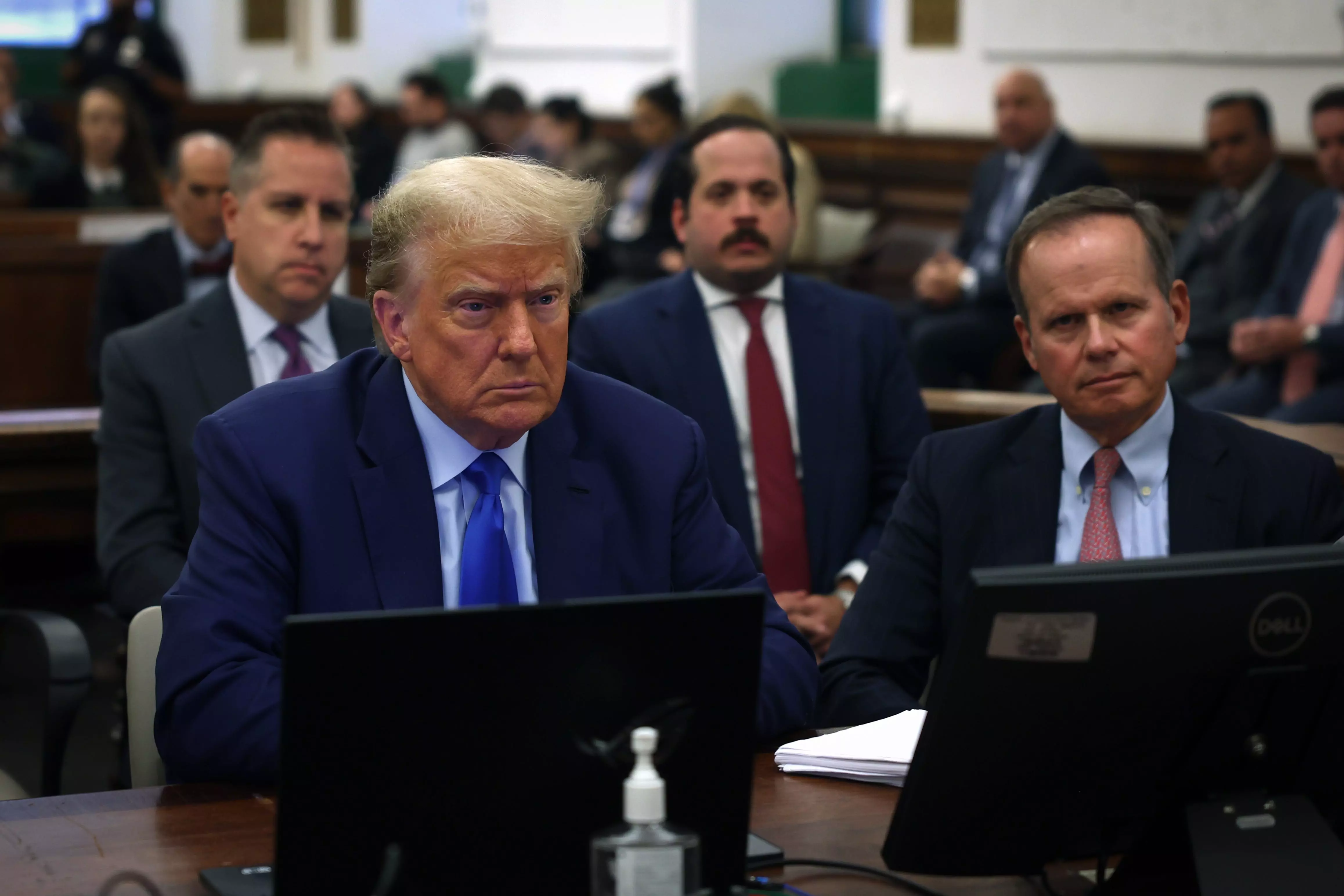 Donald Trump seated with his attorney Christopher Kise during his civil fraud trial.