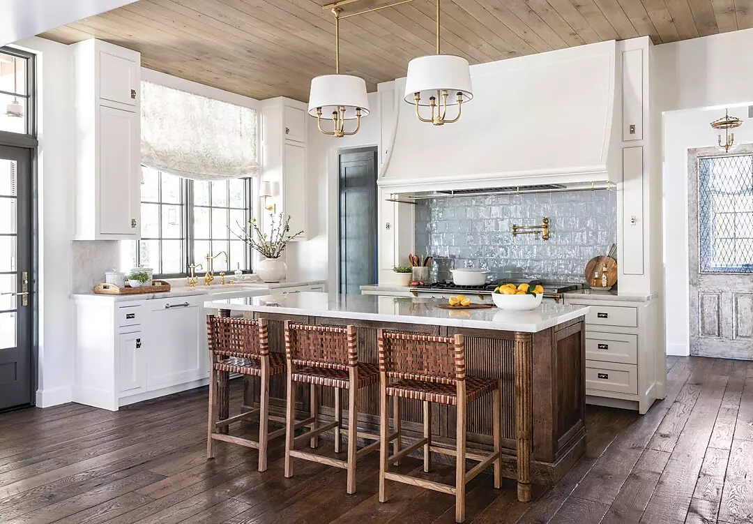 A white-themed dining room designed by Marie Flanigan